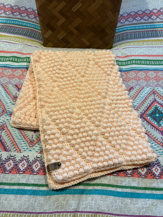 Couverture à pompons